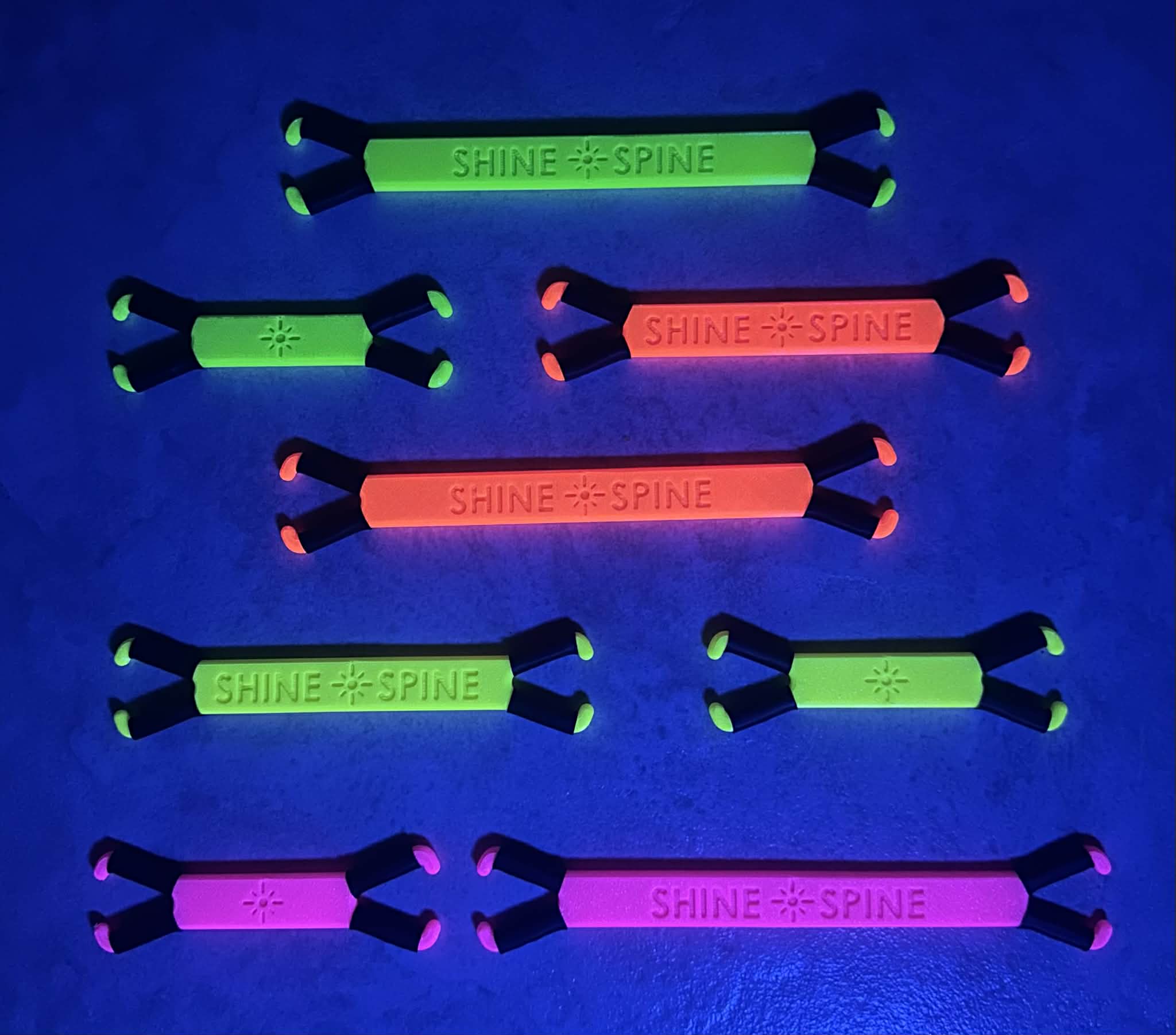 Set of 'Shine Spine' products under UV light