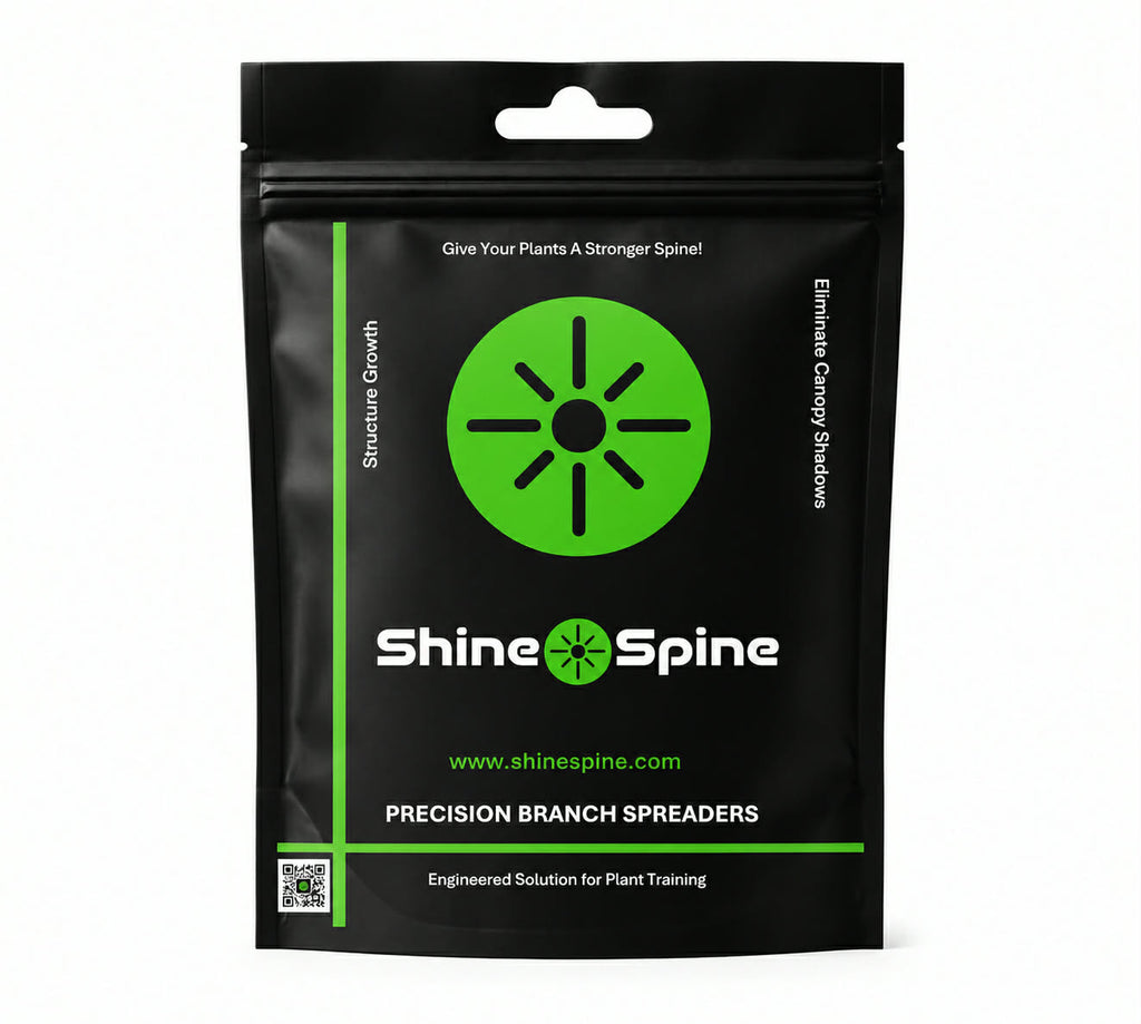 Shine Spine branch spreaders being loaded intoclear packaging