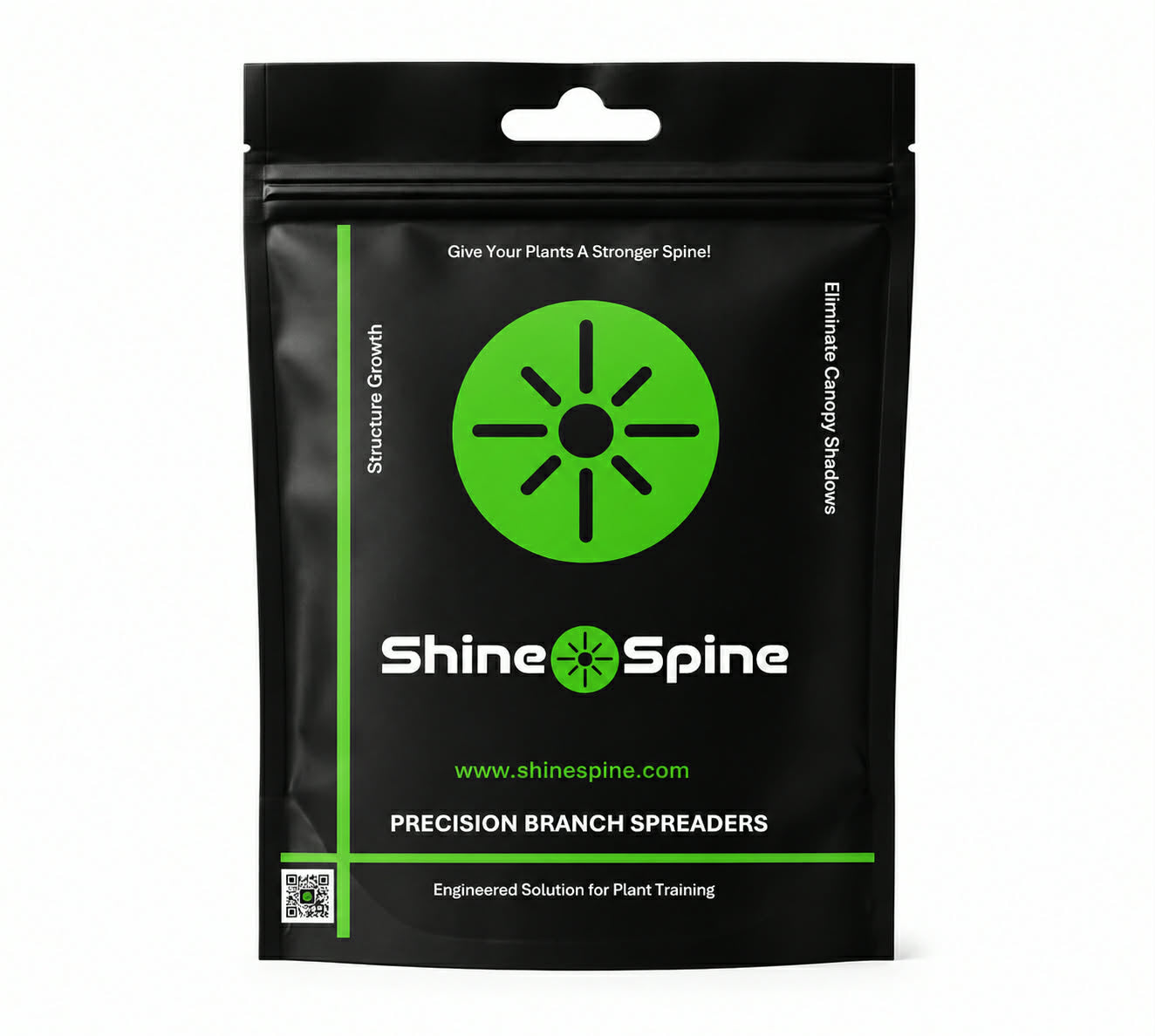 Shine Spine branch spreaders being loaded intoclear packaging